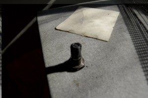 This is not a photograph by Heimrad Bäcker but is similar in content. It is a beautiful picture of an oil pan plug in the studio of Steuart Bremner, who took the photo.