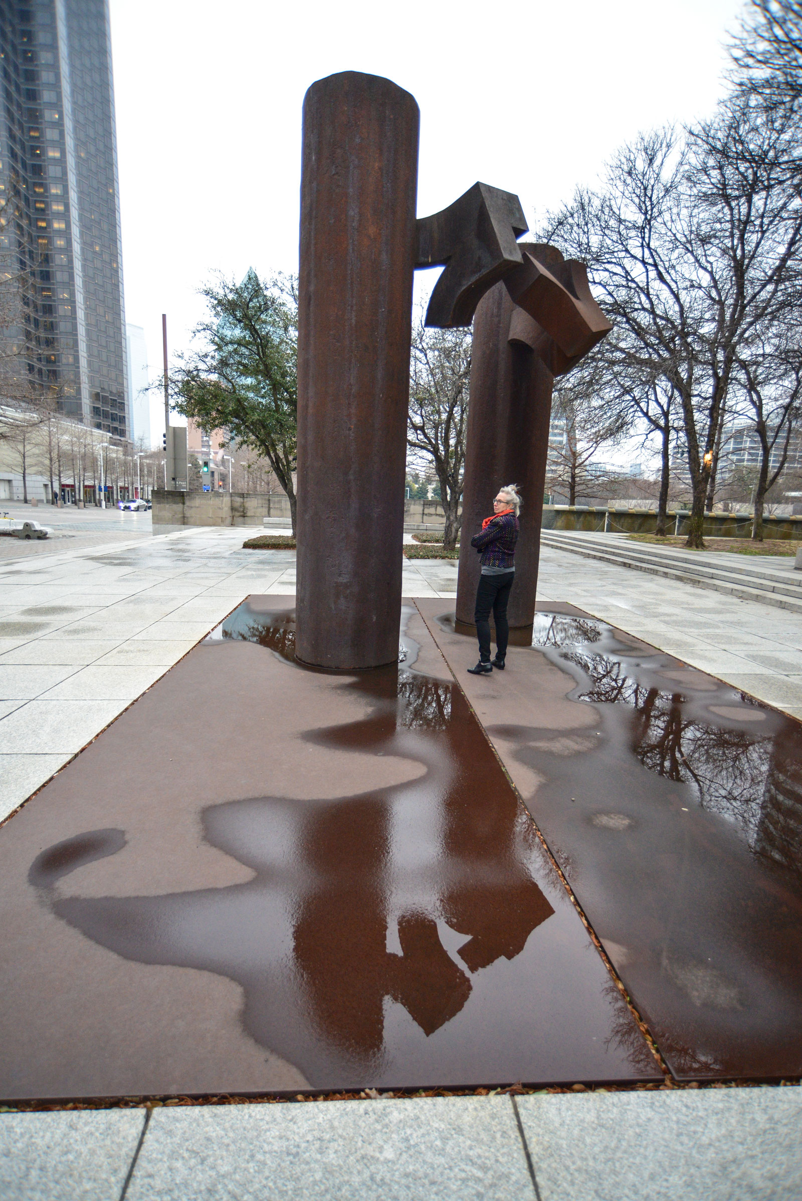 After the rain Terry stands near the Chillida sculpture outside the Meyerson Hall, Dallas, Tx